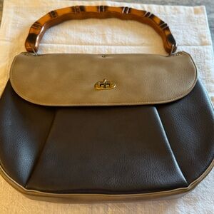 Elegant Black and Tan Shoulder Bag with Bamboo Handle
